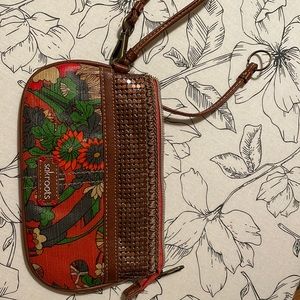 Like new. Adorable wristlet